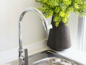 Close up of a tap and sink